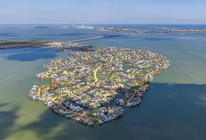 This is the Village of Tiki Island, a unique man-made canal community in Galveston County, Texas