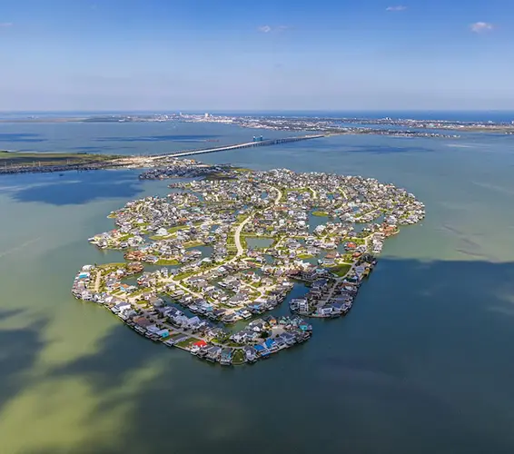 This is the Village of Tiki Island, a unique man-made canal community in Galveston County, Texas